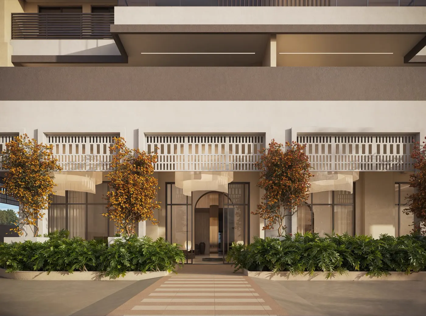 Entrada e lobby do KRONOS by Tegra com arco iluminado e jardim